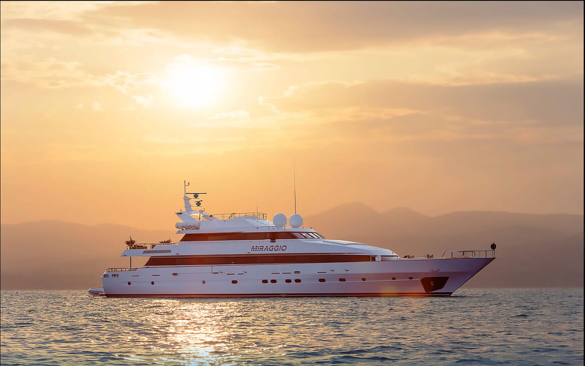 Motor yacht MIRAGGIO hero shot on water at sunset