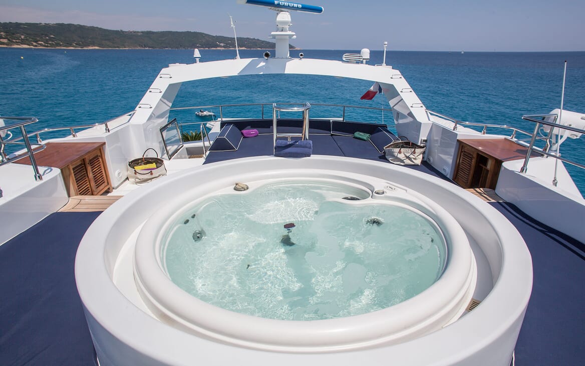 Motor yacht MIRAGGIO aerial hero shot with view of top deck jacuzzi