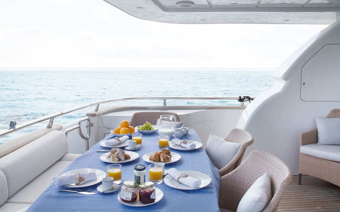 Motor Yacht SEVEN C Aft Deck Dining Table
