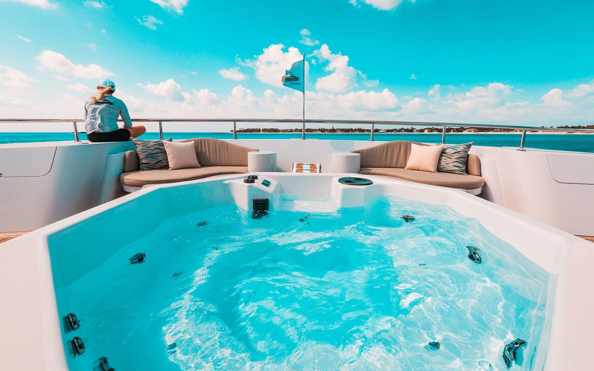 Motor yacht SAMARA jacuzzi shot with views of turquoise water
