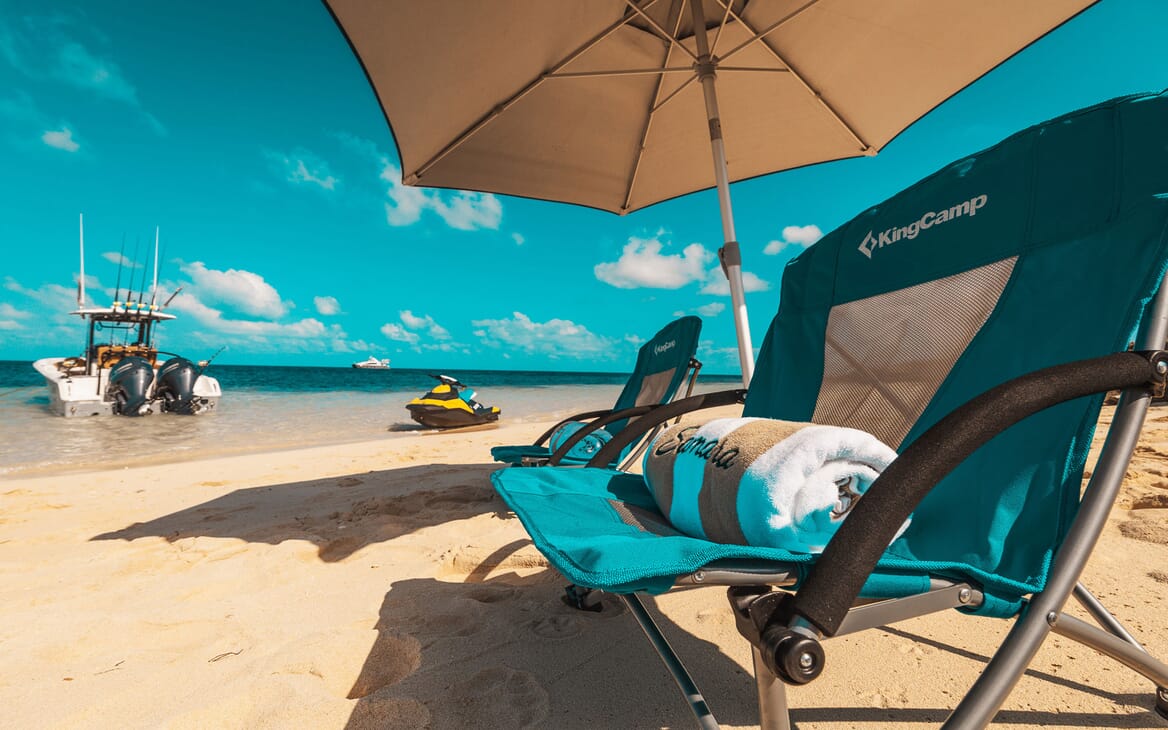 Motor yacht SAMARA beach shot of deckchairs and umbrella