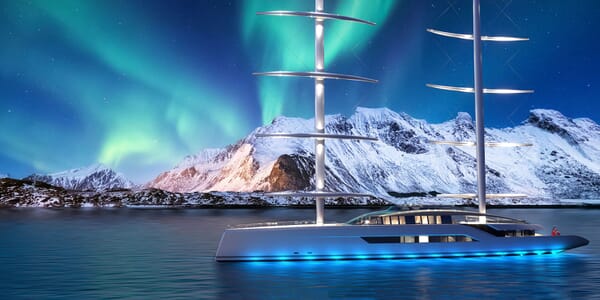 Motor yacht NEW DAWN hero shot on water with blue lighting and Northern lights in background