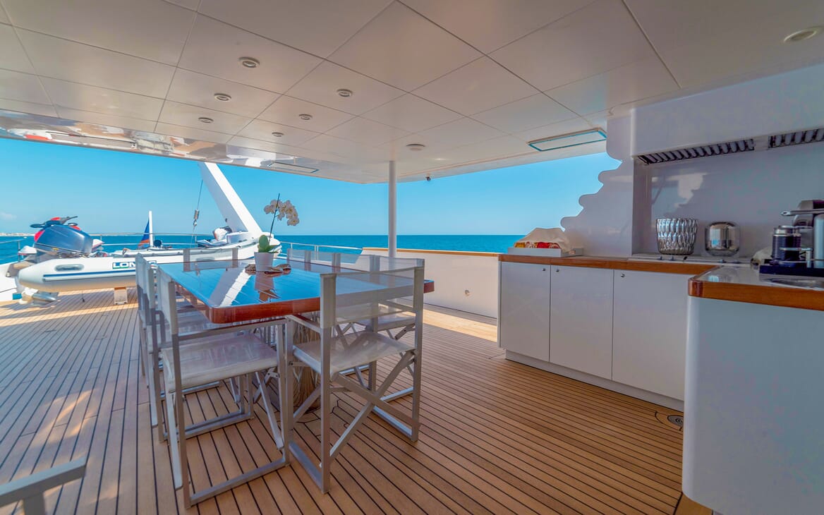 Motor Yacht Berzinc Aft Deck Table