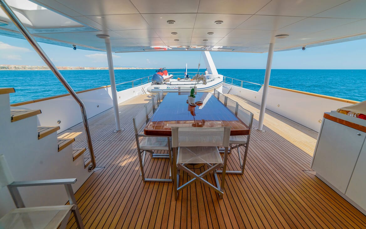 Motor Yacht Berzinc Aft Deck Dining Table