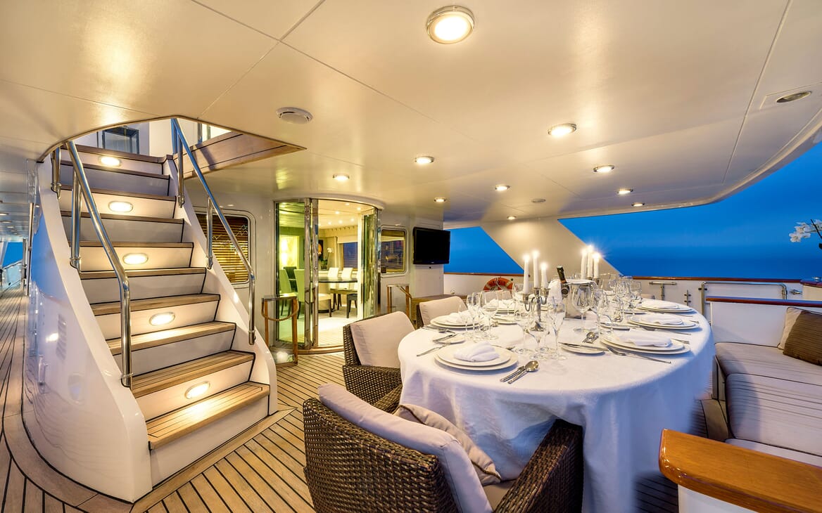 Motor yacht Superfun alfresco dining area with laid table